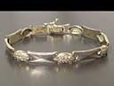 This is a lovely 14ct yellow & white Gold Altinbas bracelet with faux Diamonds. 