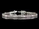 A gorgeous vintage solid Silver & Rhinestone bracelet, comprising of 12 beautiful Round Cut Rhinestones interspeced by articulated Greek Key design links