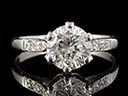A gorgeous vintage Platinum & Diamond Art Deco engagement ring, comprising of a beautiful 1.03ct Brilliant Cut Diamond